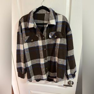 Woman’s brown shacket in size medium never worn